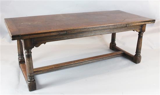 A 17th century style oak draw leaf refectory table, 3ft x 7ft, extends to 11ft H.2ft 6in.